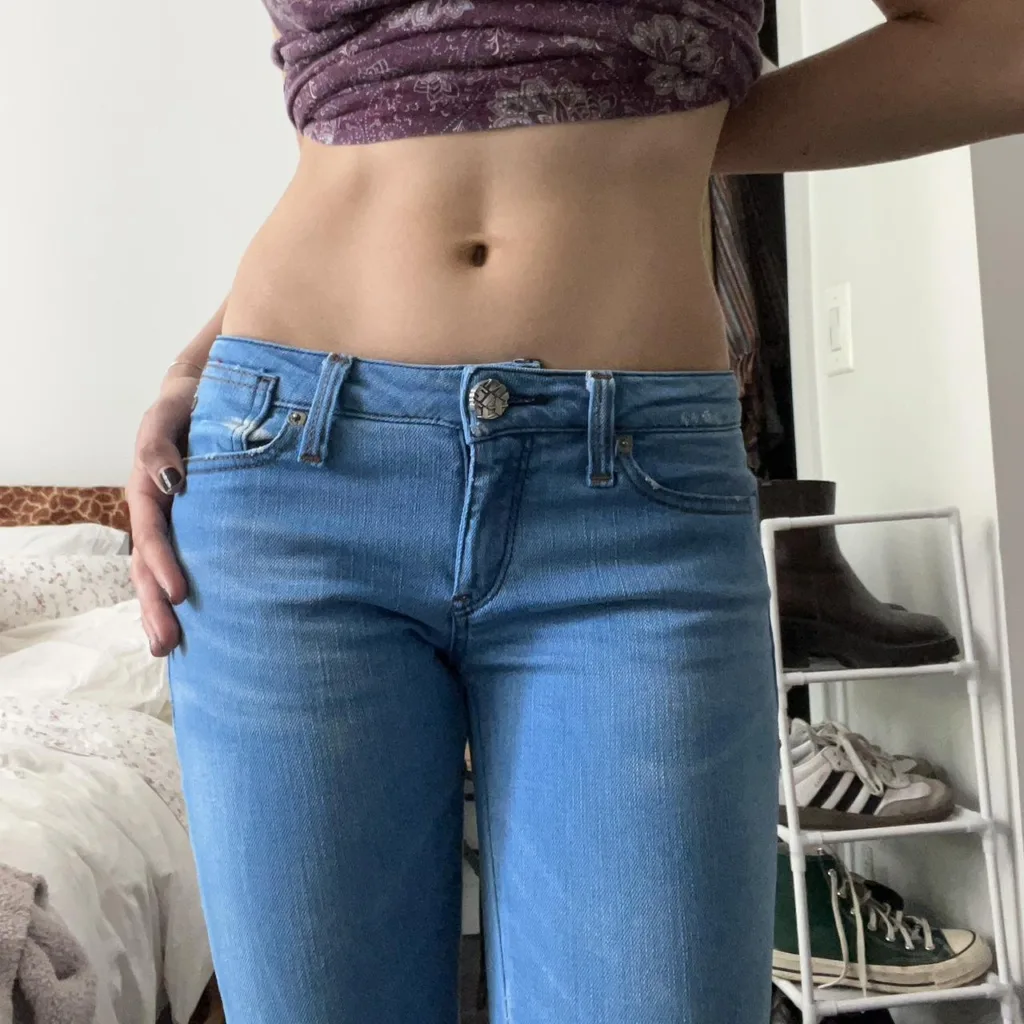 girl teasing in tight jeans
