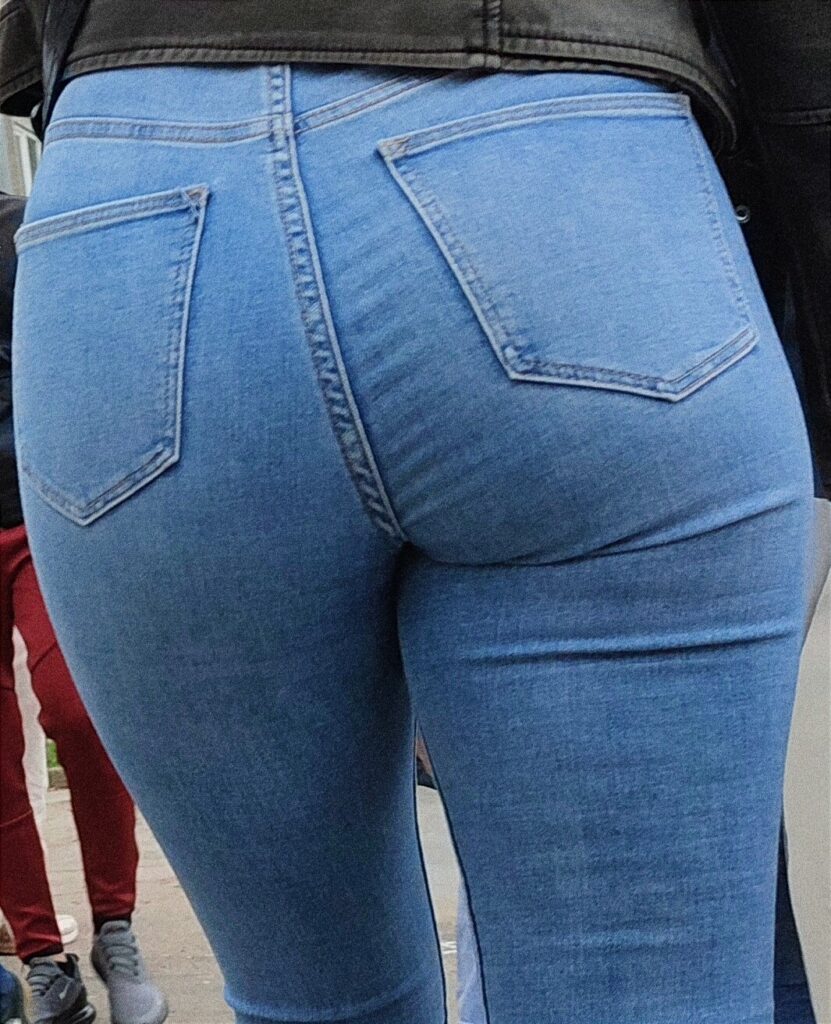 Candid in tight blue jeans