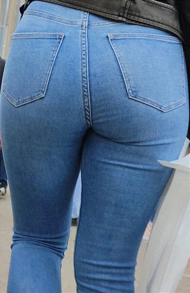 Candid in tight blue jeans