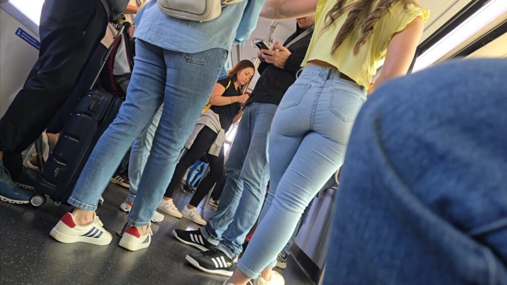 candid girl on the bus wearing tight jeans