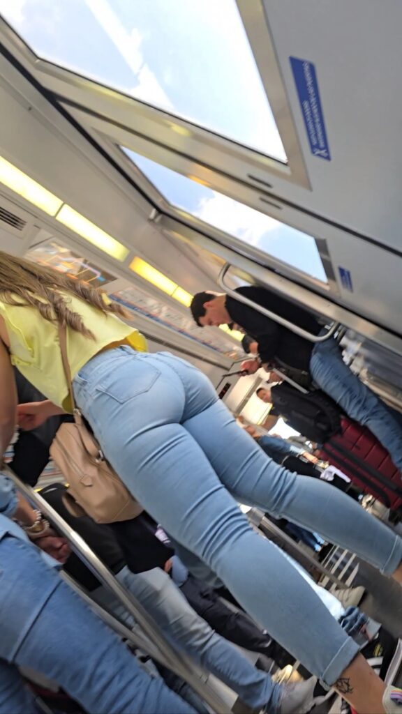 candid girl on the bus wearing tight jeans