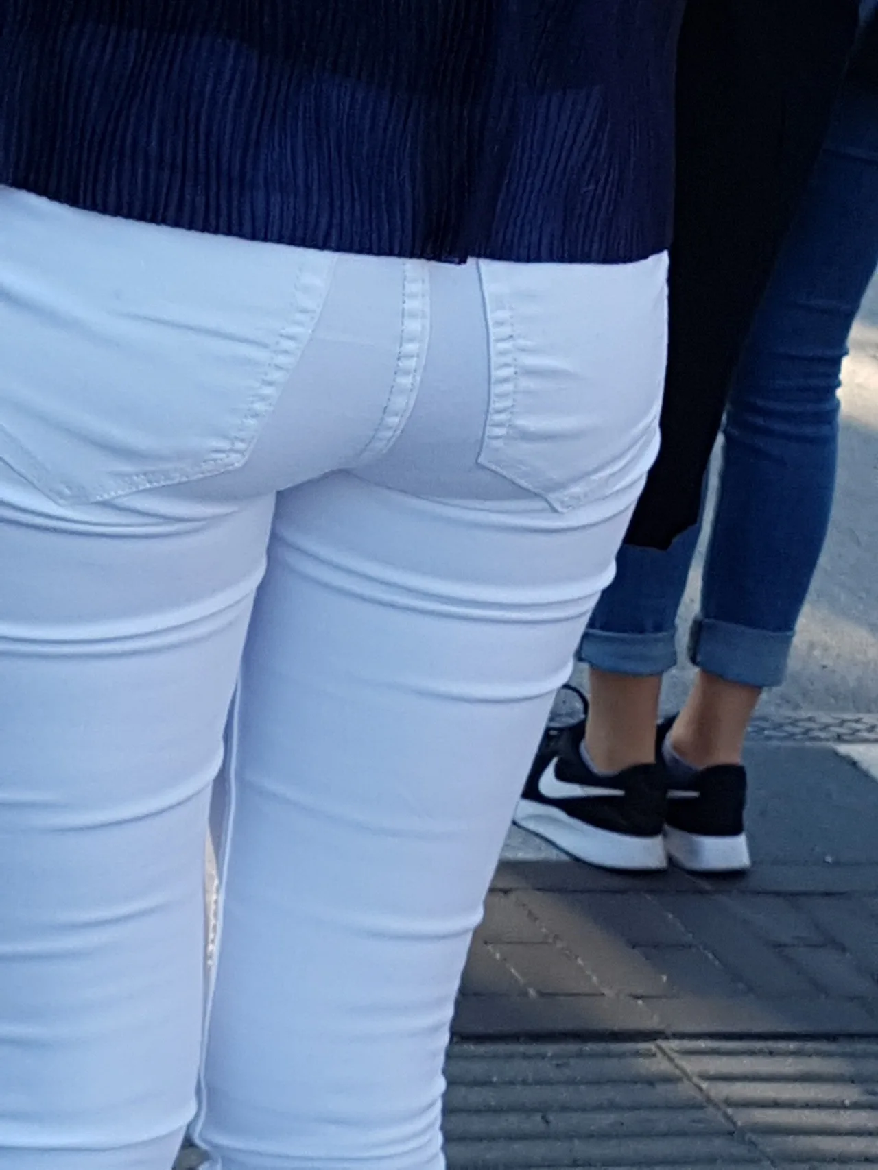 Sexy tight ass in tight white jeans.