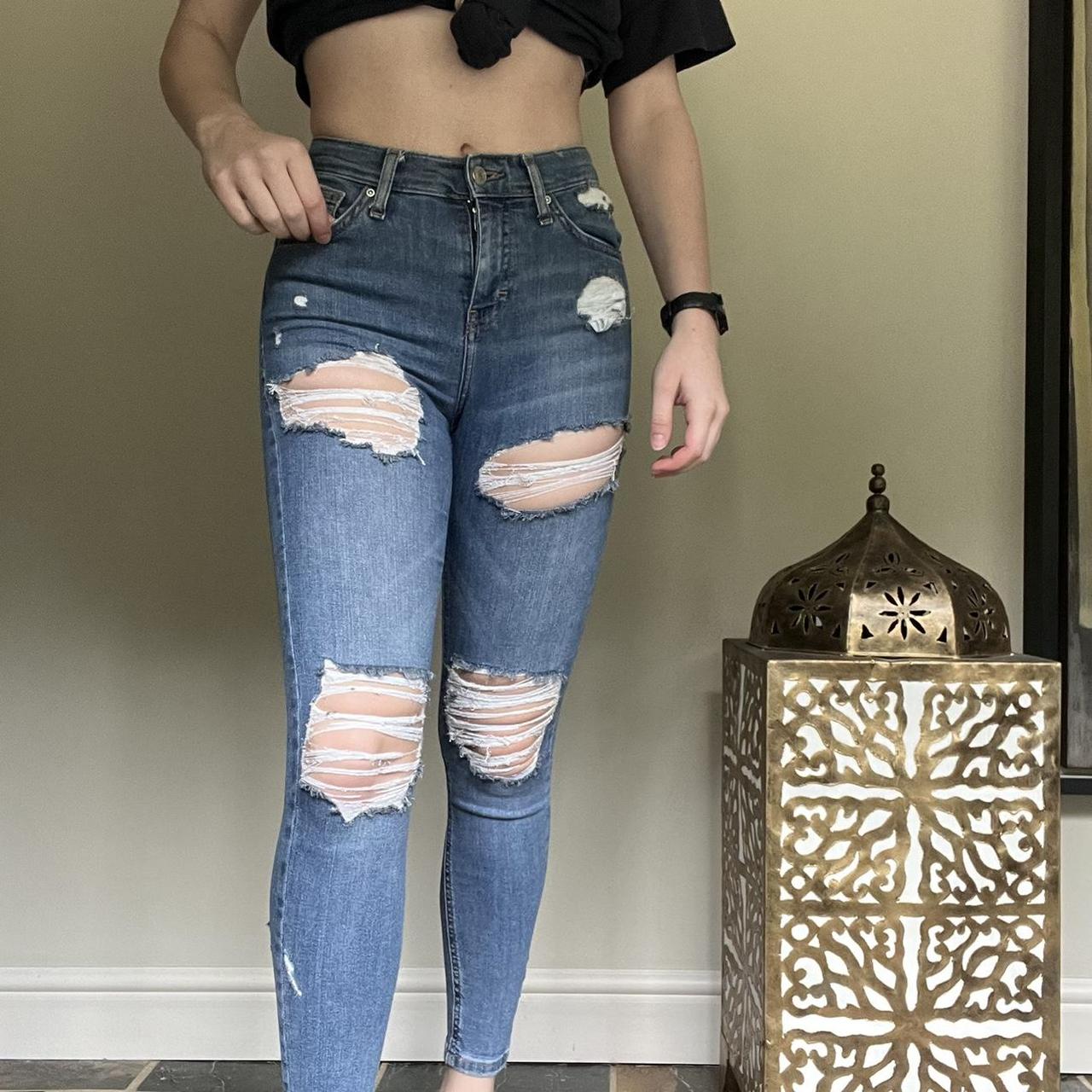 Sexy girl wearing skintight Levis jeans