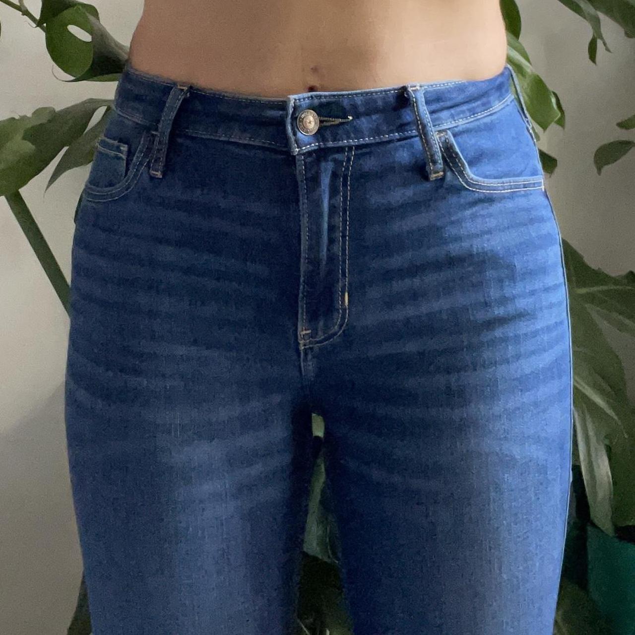 Frontal photo of a girl wearing tight Hollister jeans.
