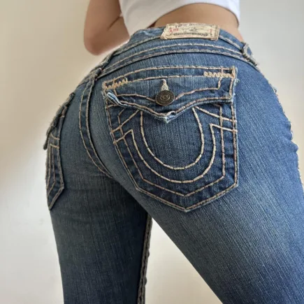 a photo of a girl wearing skintight true religion jeans.