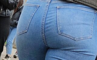 Candid in tight blue jeans