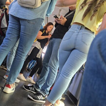 candid girl on the bus wearing tight jeans