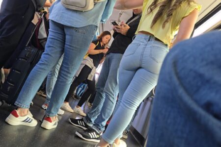 candid girl on the bus wearing tight jeans