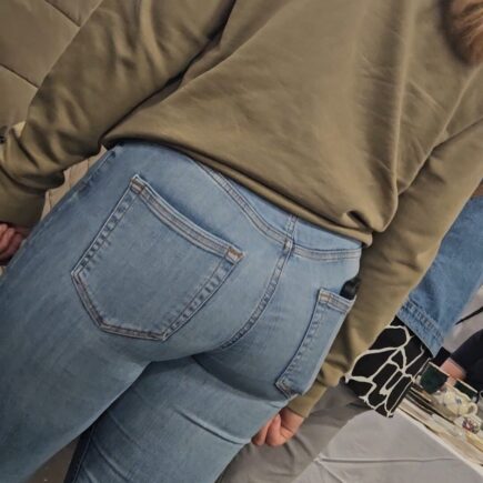 girl wearing tight blue jeans, showing her sexy ass